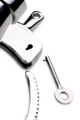 CockCuff chastity device showing the L-shaped locking bar - BDSM Authority