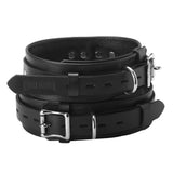 Leather thigh cuffs with locking buckle and D-ring attachment points - BDSM Authority
