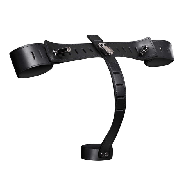 Black leather wrist to cock restraint harness with metal buckles and a curved back strap - BDSM Authority