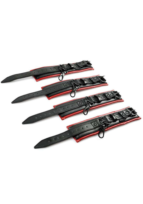 Four red and black padded faux leather cuffs from the Sportsheets Saffron set - BDSM Authority
